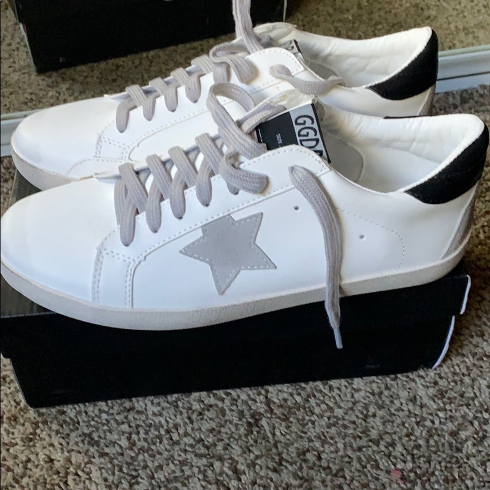Women’s star distressed sneakers